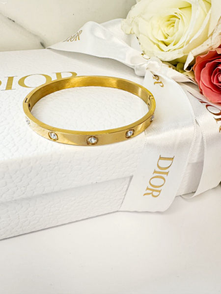 Sztywna,złota bransoletka z diamencikami