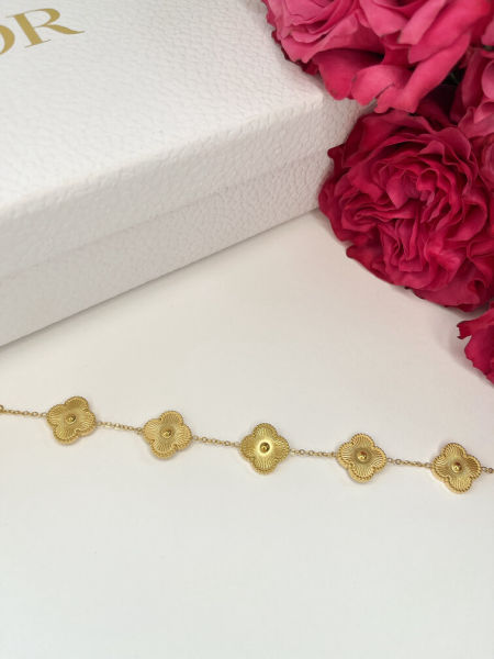 Złota bransoletka z kwiatami